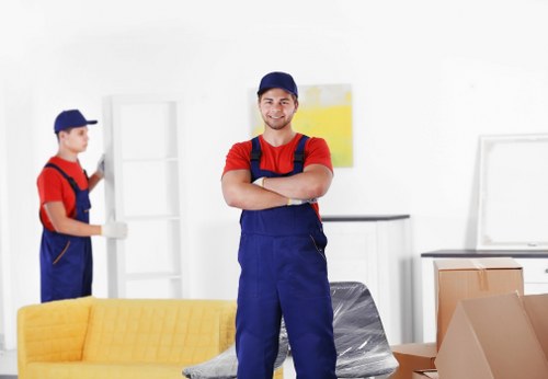 Removal team using protective measures during a house move