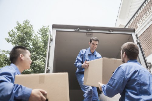 Apartment move with careful handling of boxes and furniture in Todenmark