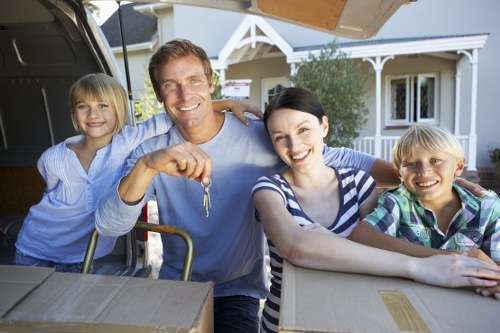 Moving company handling furniture and fragile items with care