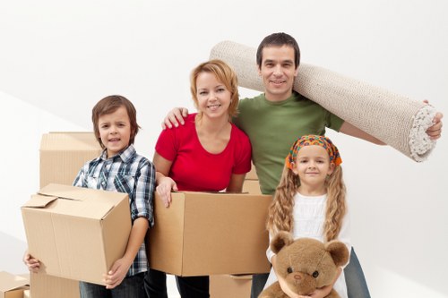 Team communicating safely during a furniture move