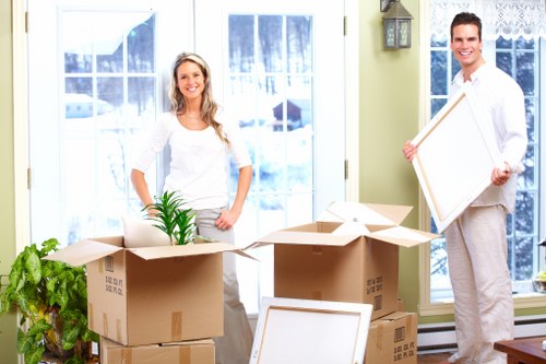 Local team collecting sofas and wardrobes from a Todenmark property