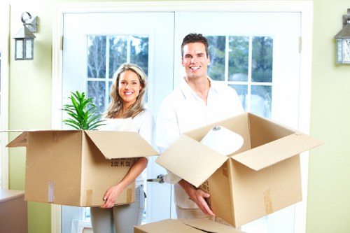 Business move checklist and packed office items ready for collection